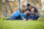 Happy Young Mixed Race Ethnic Family Playing Together with Bubbles In The Park..jpg