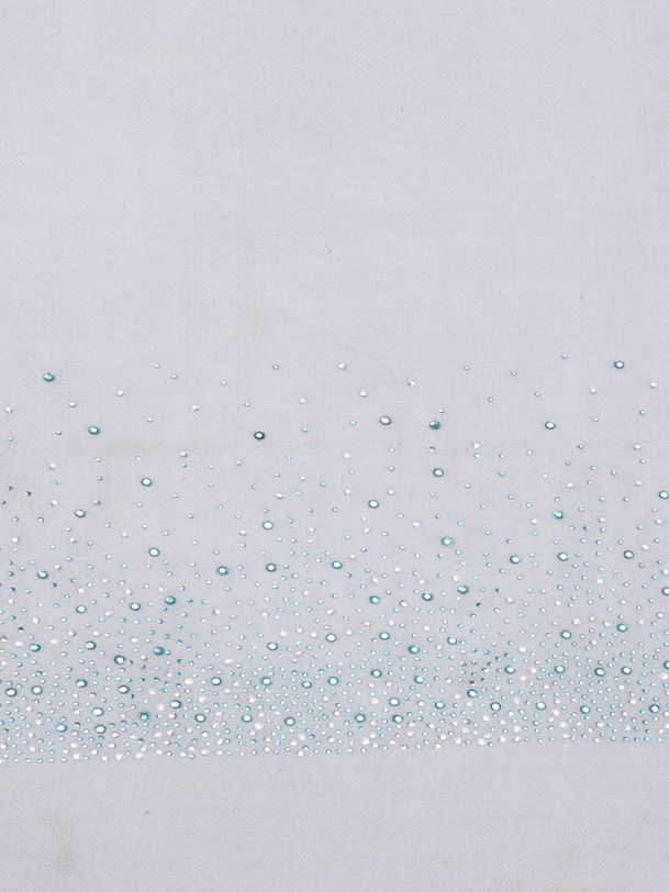 Icy blue cashmere stole with Swarovski star sparkle embellishment, styled for party and festive wear