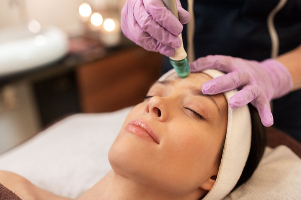 woman-having-microdermabrasion-facial-treatment-2021-08-26-22-51-30-utc.jpg