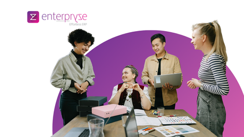 team collaborating on CRM strategy and sales notifications in modern office setting