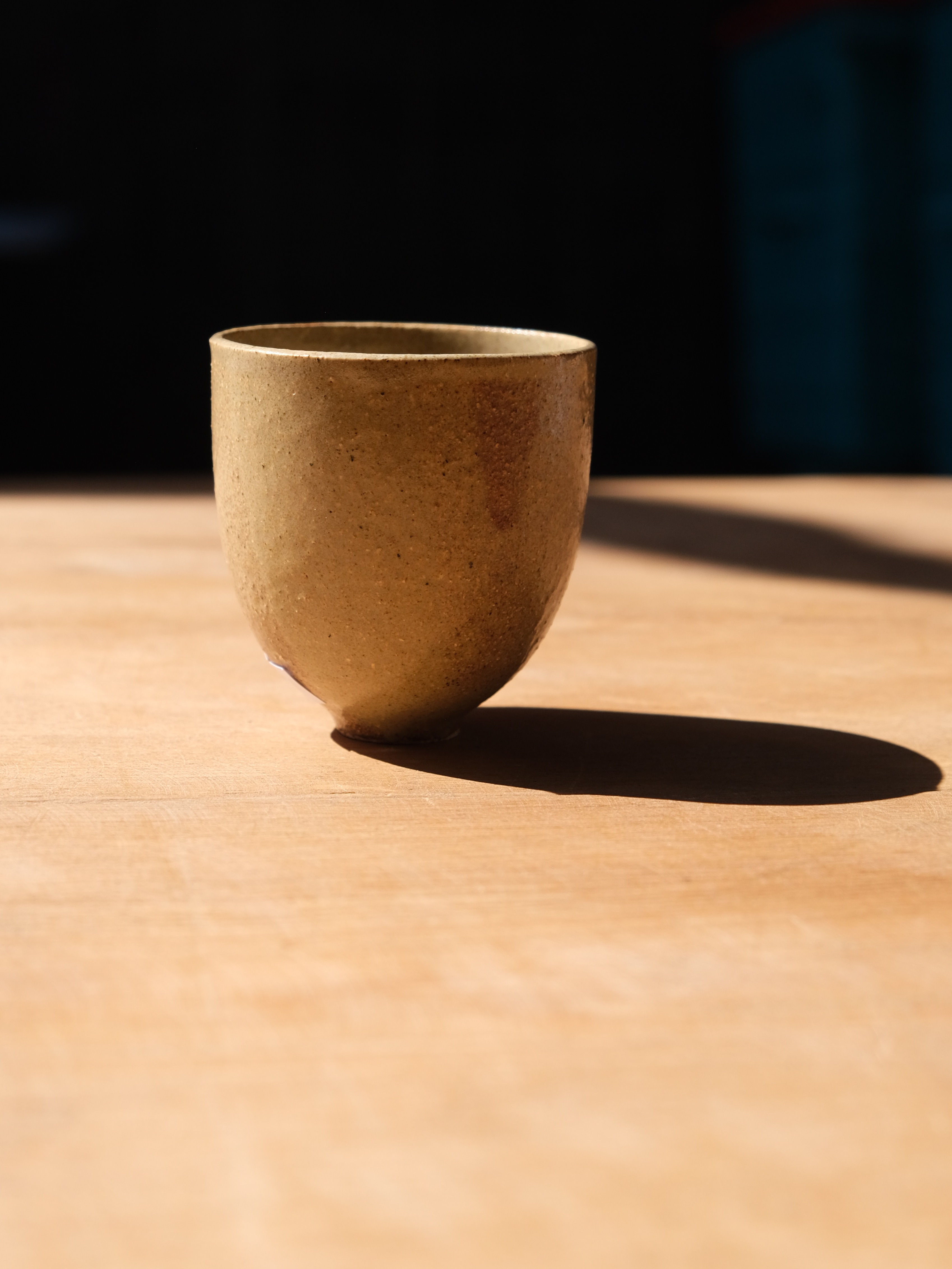 Stoneware beaker handcrafted ceramic cup with natural glaze finish for everyday use