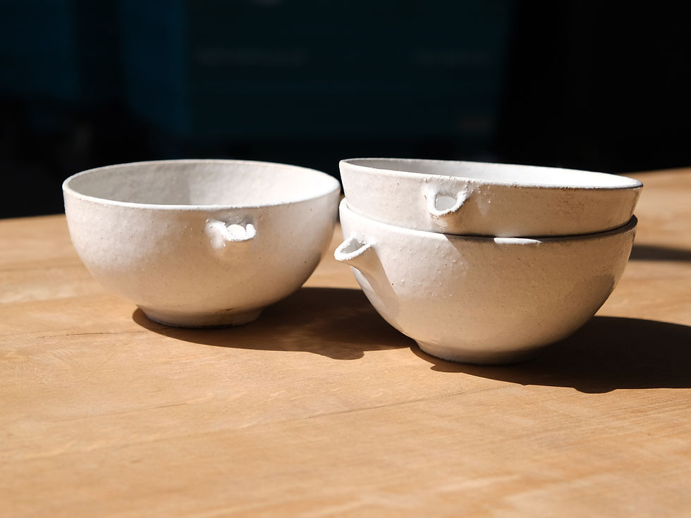 Stoneware pouring bowl with natural glaze for kitchen use