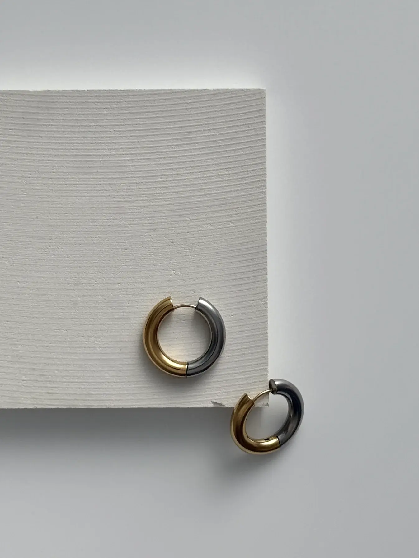Luminarium chunky gold-plated stainless steel hoop earrings