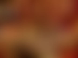 A close-up of a runner or walker tying the laces of supportive athletic shoes with holiday lights blurred in the background, symbolizing staying active and pain-free through Christmas week.