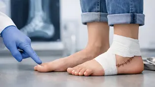 Podiatrist providing personalized foot and ankle care during a patient visit at Orange Sky Podiatry
