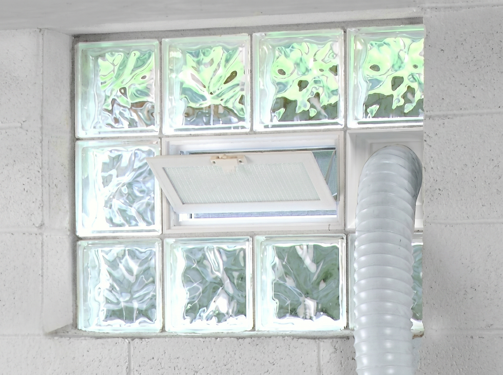  A glass block window with hopper vent installed in an Orland Park, IL basement by Legacy Glass Block