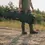 Thumbnail: Person carrying durable hard rifle case outdoors