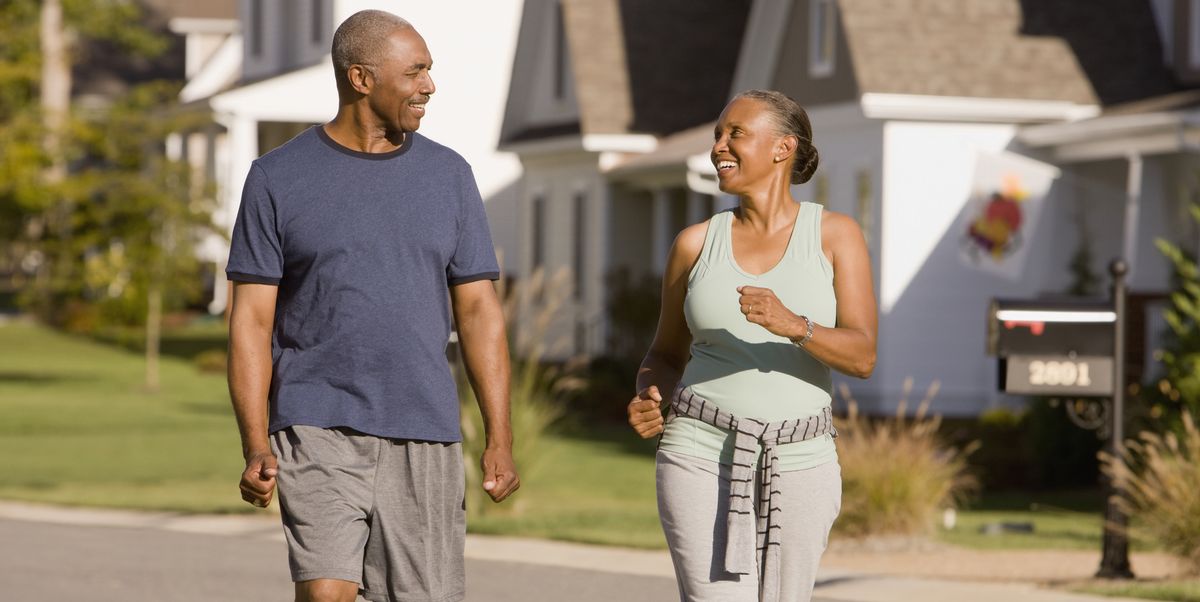 happy couple walking outside