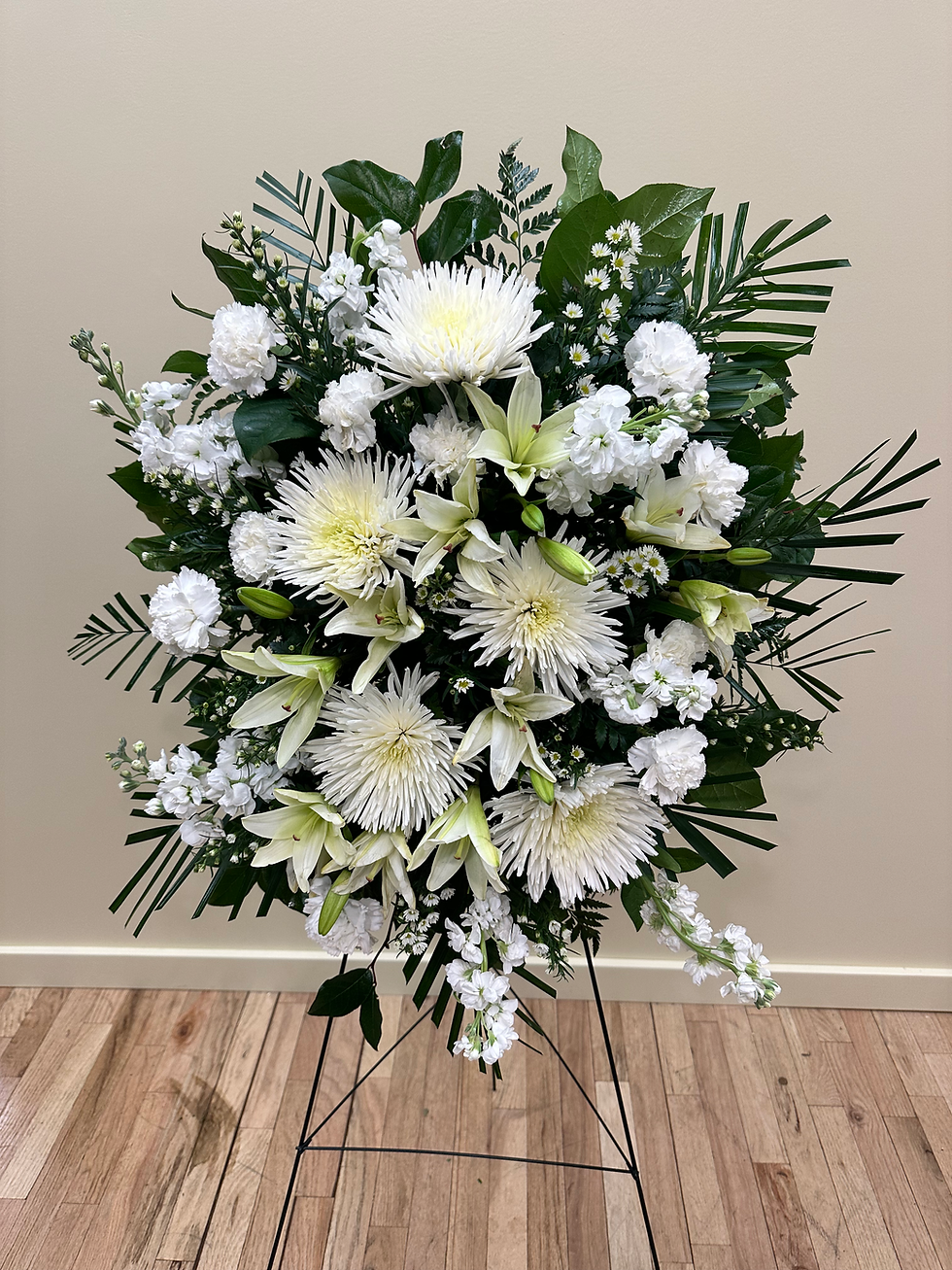 Thumbnail: Classic standing spray with white carnations, lilies & stock
