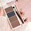 Thumbnail: A set of 4-color eyebrow powder trays with brushes in gray and brown matte tones