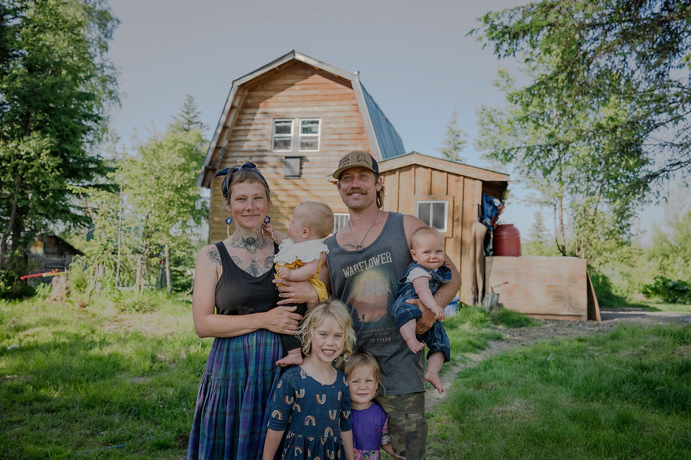 family of 6 in an off-grid tiny home on wooded acreage in Alaska