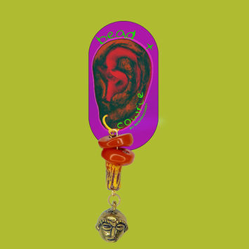 Bright lime-green Bead + Cowrie graphic featuring a stylized ear inside a purple oval frame, with layered red and gold jewelry forms and a small sculptural charm hanging below.