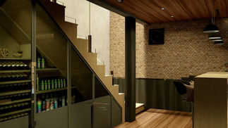 Adega subterrânea residencial reformada, com atmosfera intimista e sofisticada, integrando escada de acesso, bancadas de marcenaria, canto alemão rebaixado, nichos iluminados para vinhos e bebidas, controle térmico e de umidade, revestimentos em tijolinhos aparentes, cimento queimado e superfícies com aspecto de madeira, iluminação quente e cênica que valoriza a experiência sensorial e o conforto ambiental.