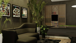 Sala de jogos residencial com mesas de sinuca e pebolim, sofá e painel com TV, integrada visualmente ao jardim de inverno por amplas aberturas envidraçadas. O ambiente apresenta piso e painéis amadeirados, iluminação direta sobre as mesas e vegetação interna, criando uma atmosfera acolhedora, elegante e conectada à natureza.