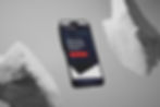 A floating smartphone displays a website with the text "Find the right MES solution"; Gray background with rocks.