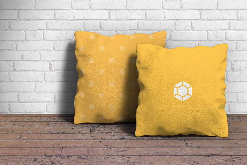 gelbes Stoffmuster Branding mit Kissen