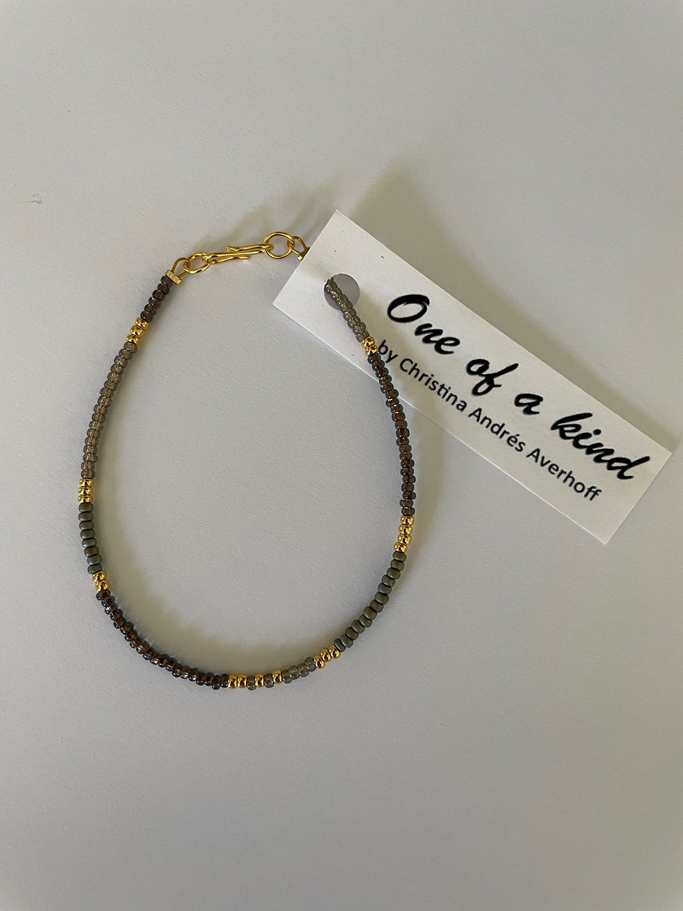 Thumbnail: Gorgeous beige, grey & gold one string bracelet