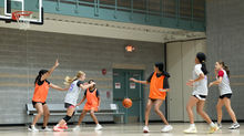 Girls playing 3v3 basketball