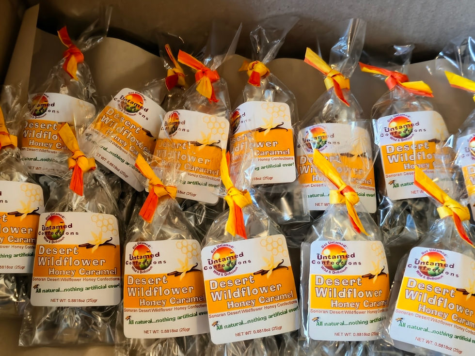 Eye-level view of honey caramels in a glass jar with a sealed lid