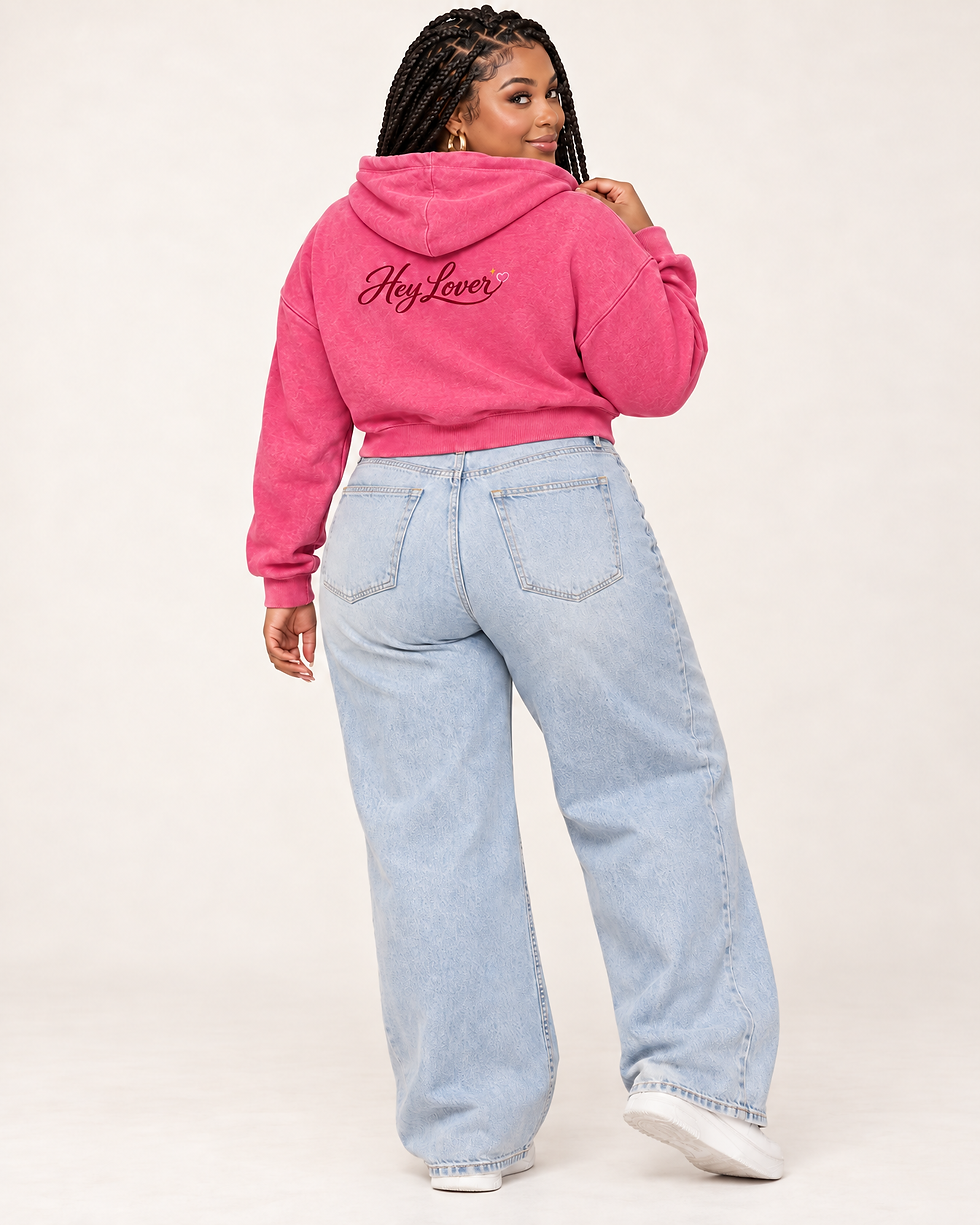 Model wearing Hey Lover hot pink cropped hoodie, back logo