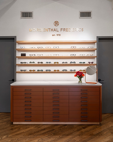Morgenthal Frederics SOHO New York location featuring the store branding with custom eyewear display