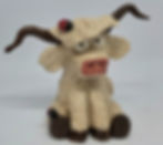 Handmade cream Highland cow ceramic sculpture with dark curved horns and two red ladybirds, By Hand & Heart