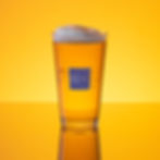 Refreshing beer in shaker pint glass Digitrust logo