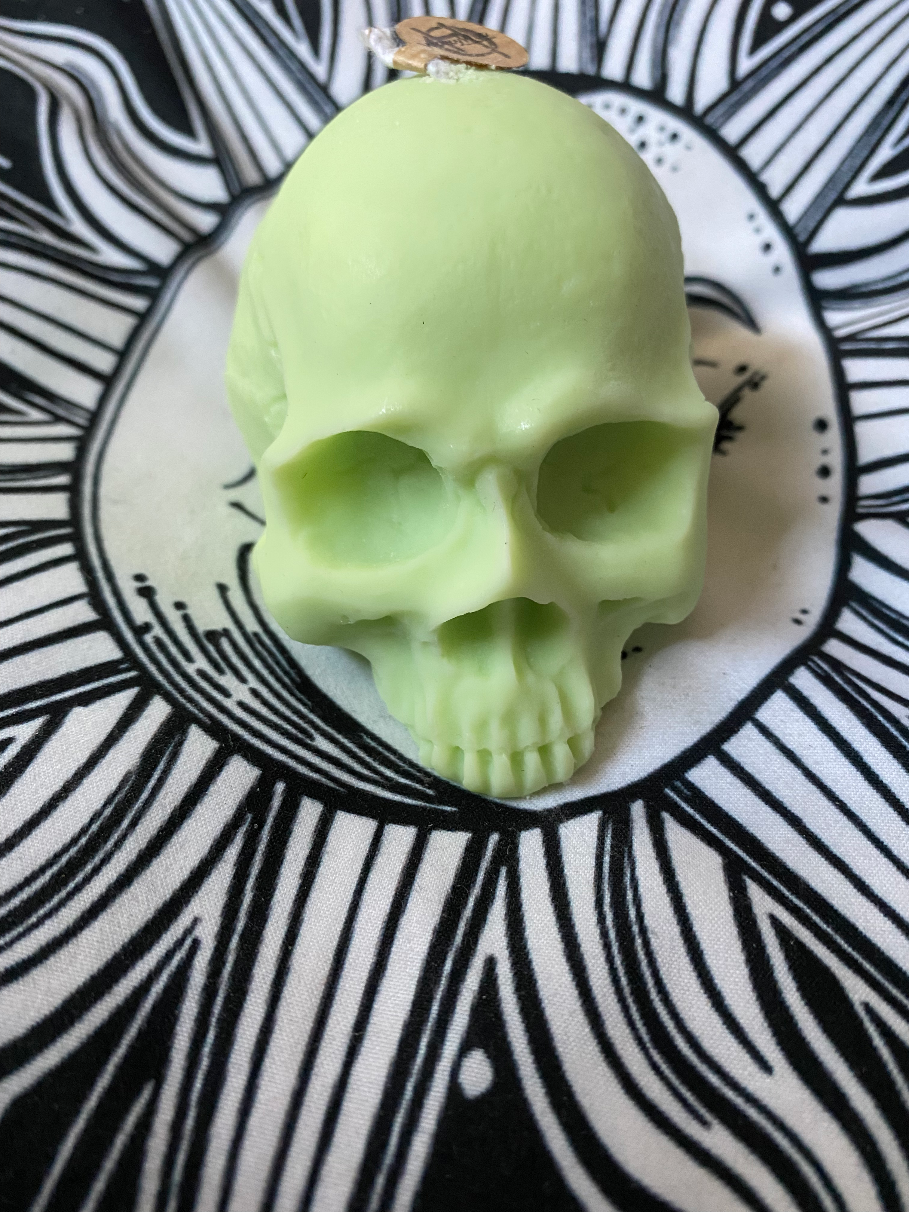 Pear drops skull candle