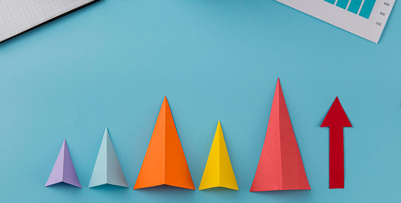 top-view-business-items-with-piggy-bank-growth-cones.jpg