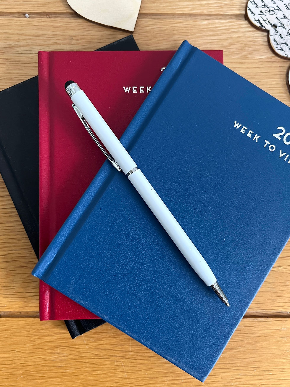 Thumbnail: 2027 A6 Diary with week to view diary in three colours, red, navy, black