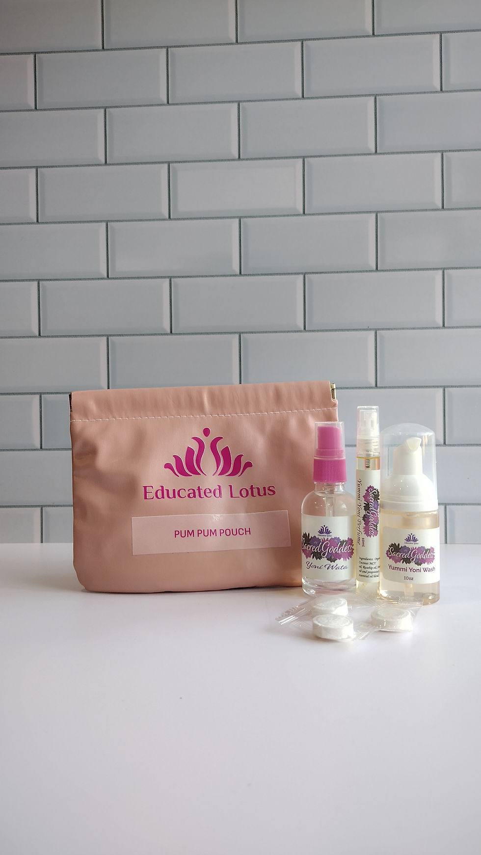 Thumbnail: Educated Lotus personal care kit with pouch and cleansers