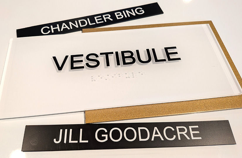 white translucent grade 2 braille vestibule-tactile sign