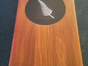 Timber board with the Silver Fern in black resin