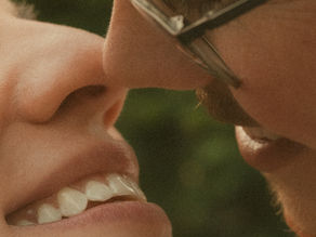 Intimate couple touching noses