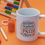 Thumbnail: History teacher gift mug on a table with bright school supplies.