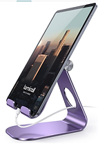 Angled desk stand displaying a notebook or tablet for planning and organization