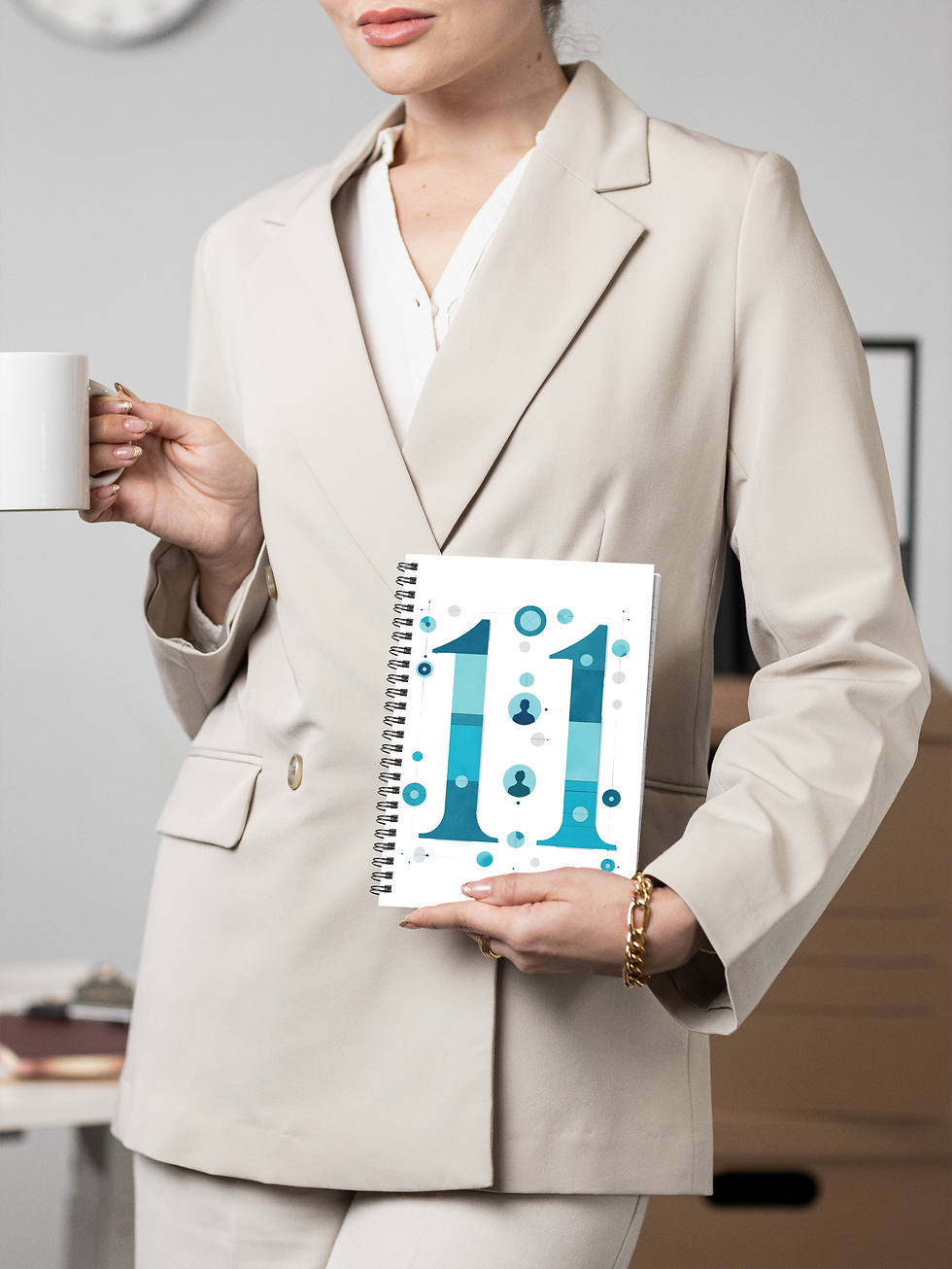 Professional holding one-on-one meeting notebook with teal 11 cover