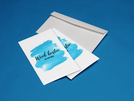 Flat lay of printable greeting cards with blue brushstroke designs and envelopes on a blue background