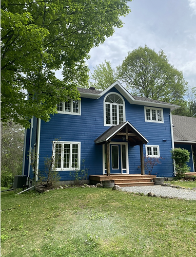 Custom-painted luxury home exterior with weather-resistant coatings