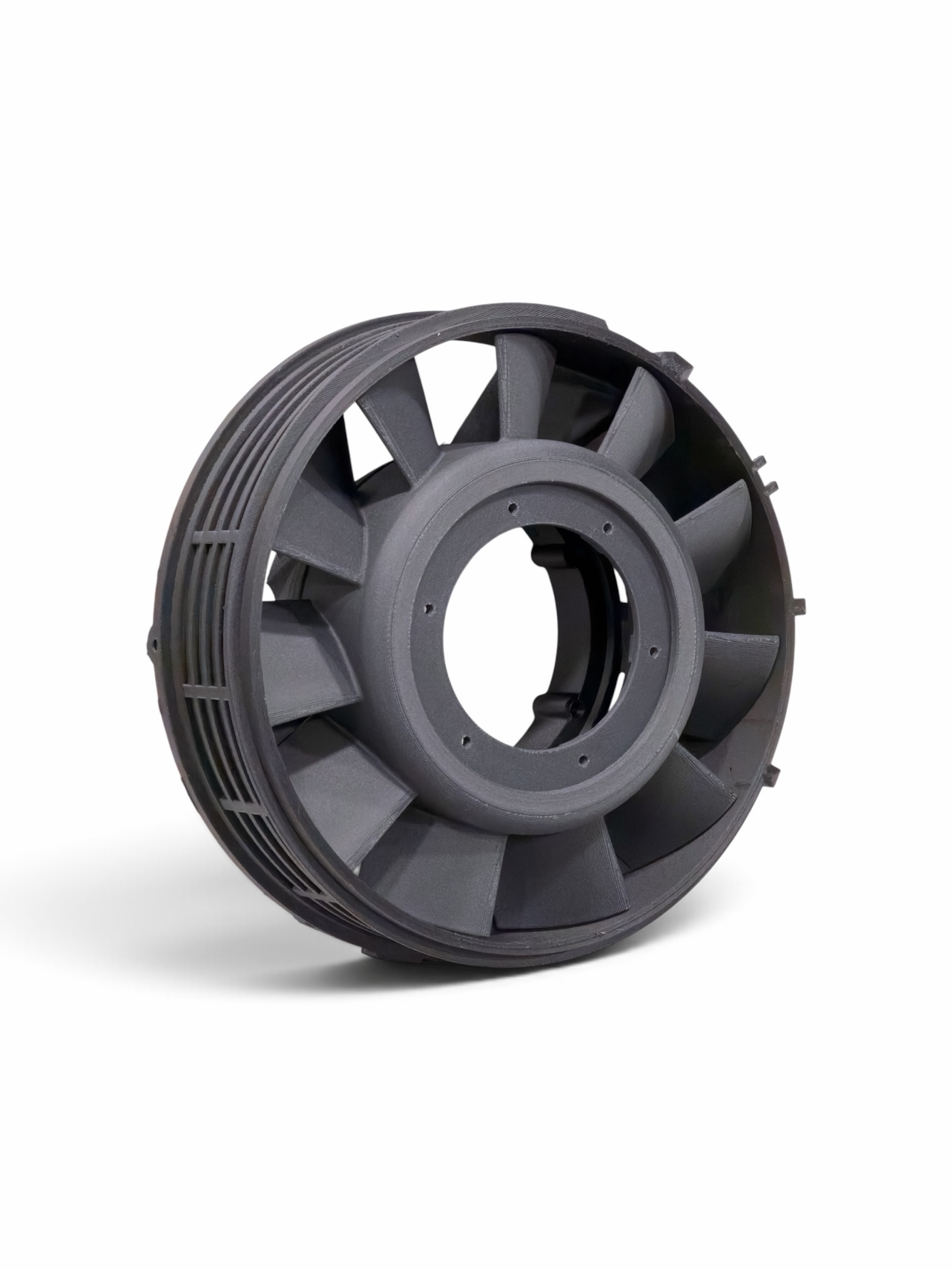 Dark carbon-fiber composite Porsche racing component with radial ribs