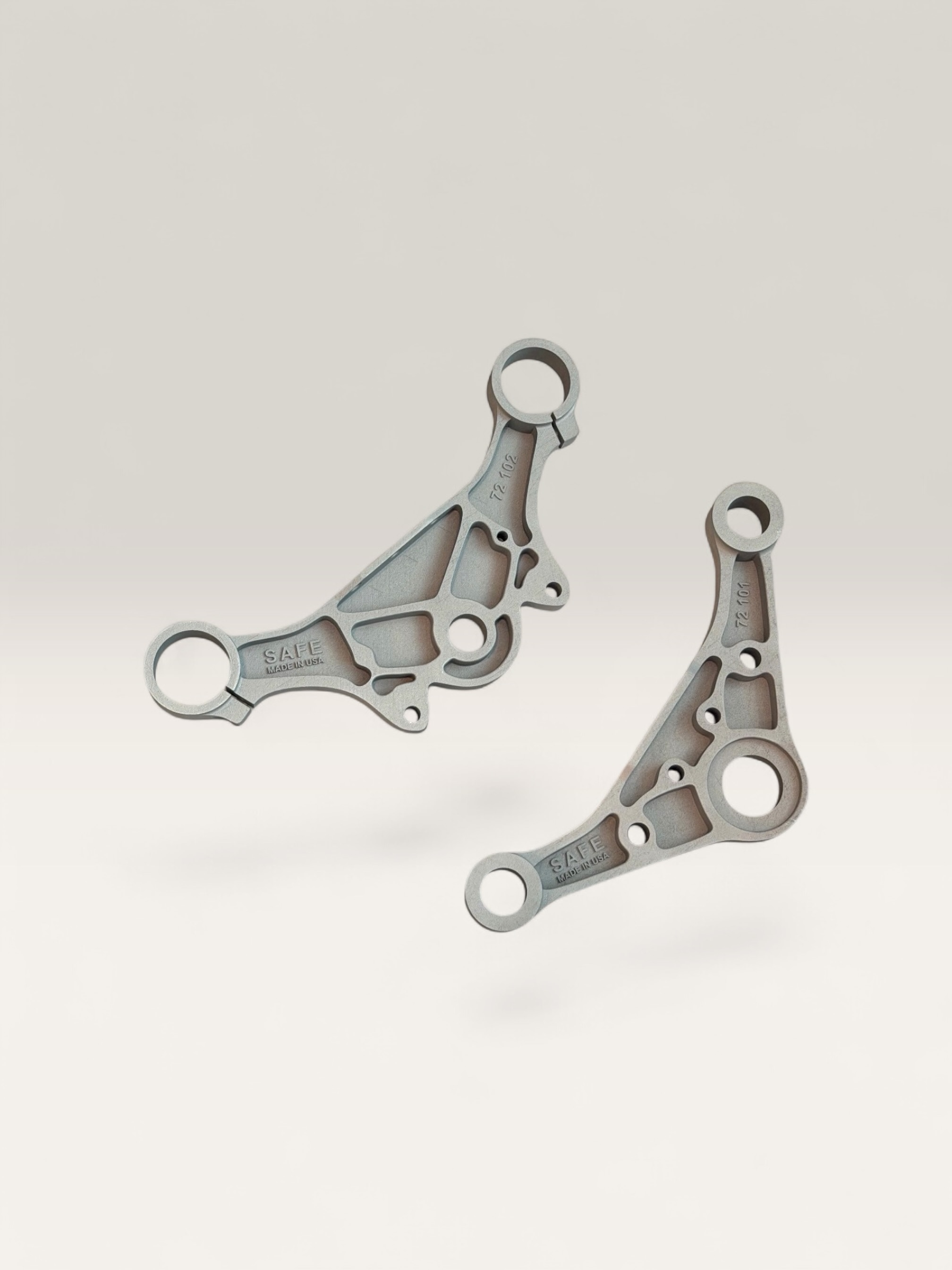 Pair of stainless steel brackets with lightweight internal geometry