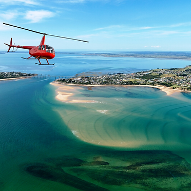 Enjoying a Scenic Flight of Phillip Island as part of your tour