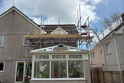Scaffolding over a conservatory