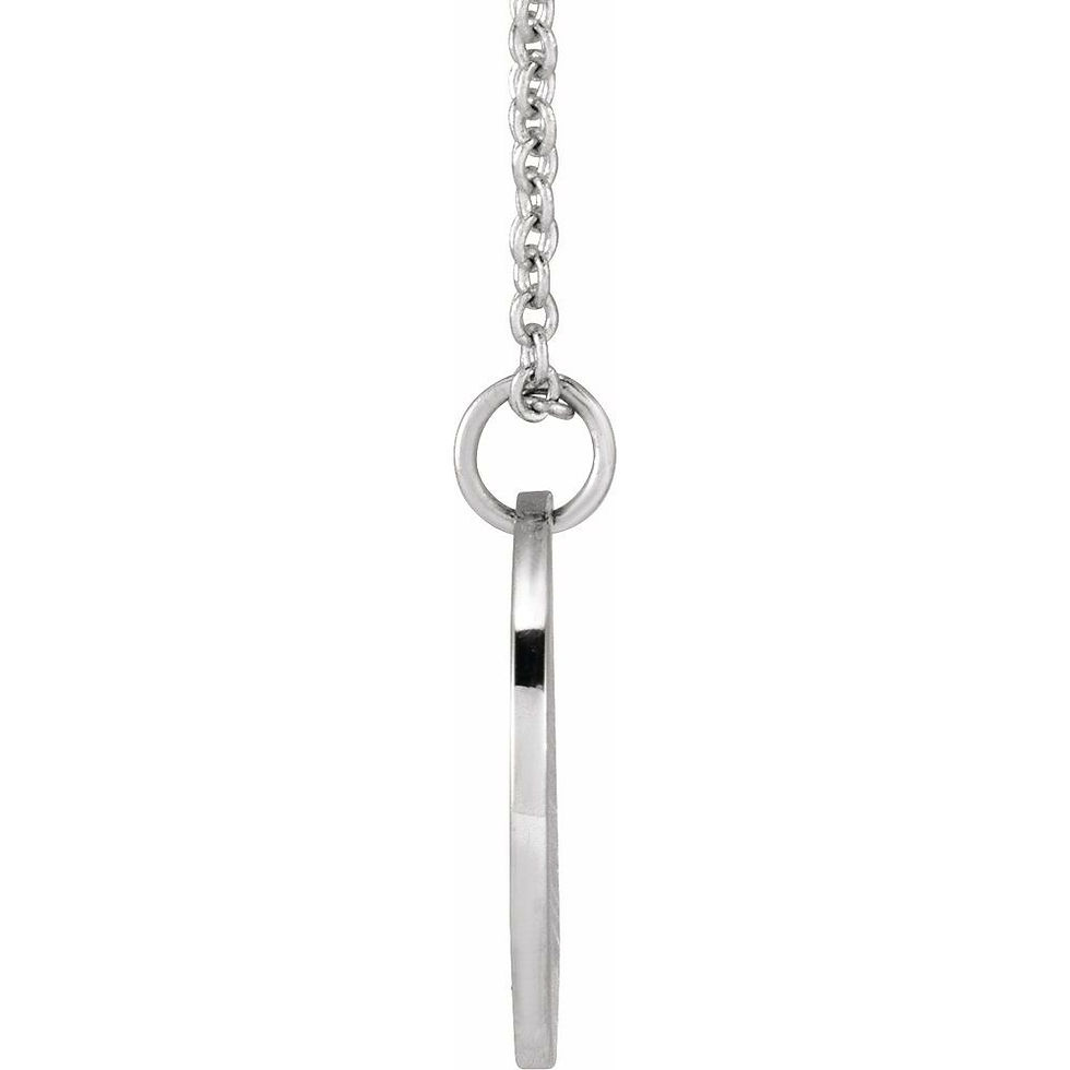 Thumbnail: Side view of sterling silver birth flower pendant showing disc thickness.