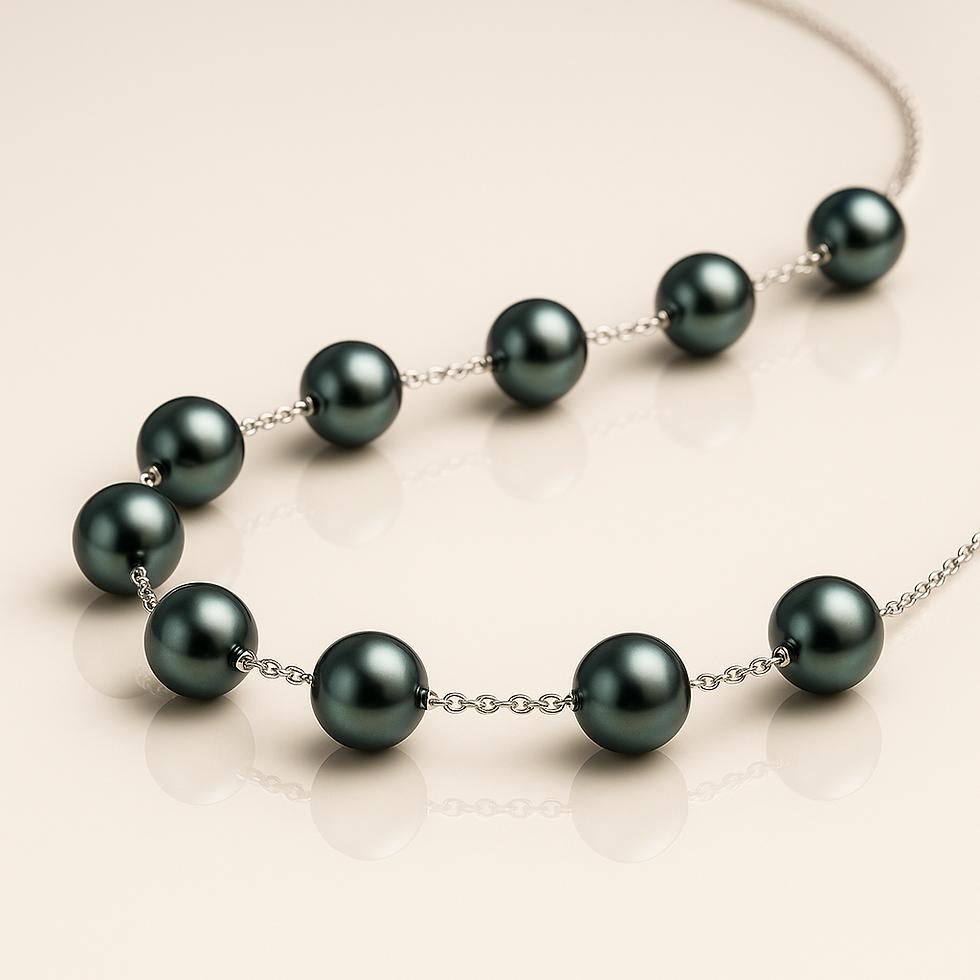 Strand necklace of black Tahitian pearls with white gold clasp.