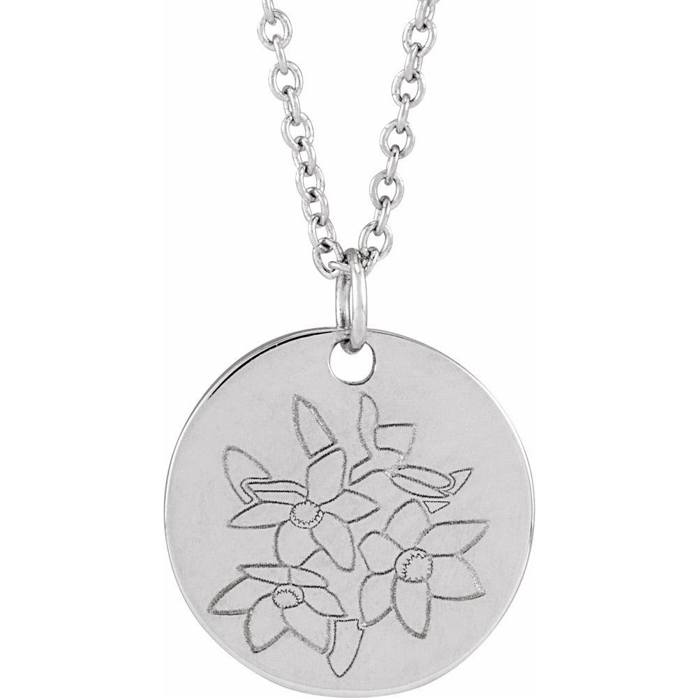 Sterling silver necklace with engraved poinsettia birth flower pendant.