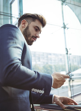 —Pngtree—attentive businessman using mobile phone_10041421.jpg