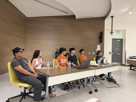 Recent high school graduates sharing college application experiences with local families