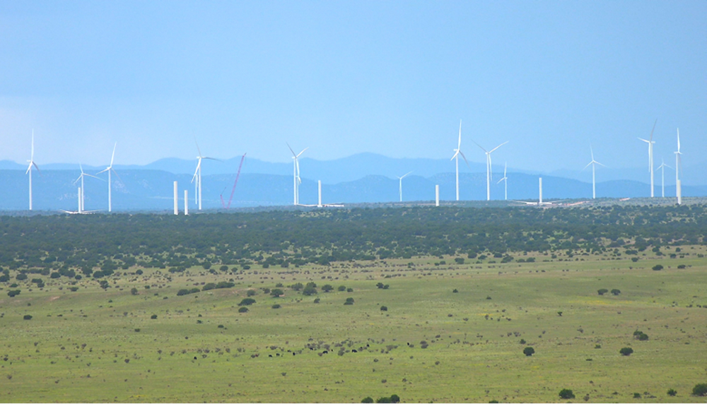 Multiple wind turbines on the wind farm in Corona, New Mexico.