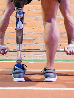 Man with Amputee Lifting Weight